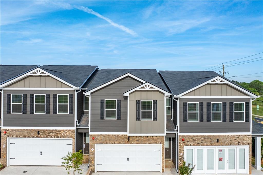 11531 Kimberly Court Hampton, GA 30228 - Photo 3 of 29 a front view of a house with a yard