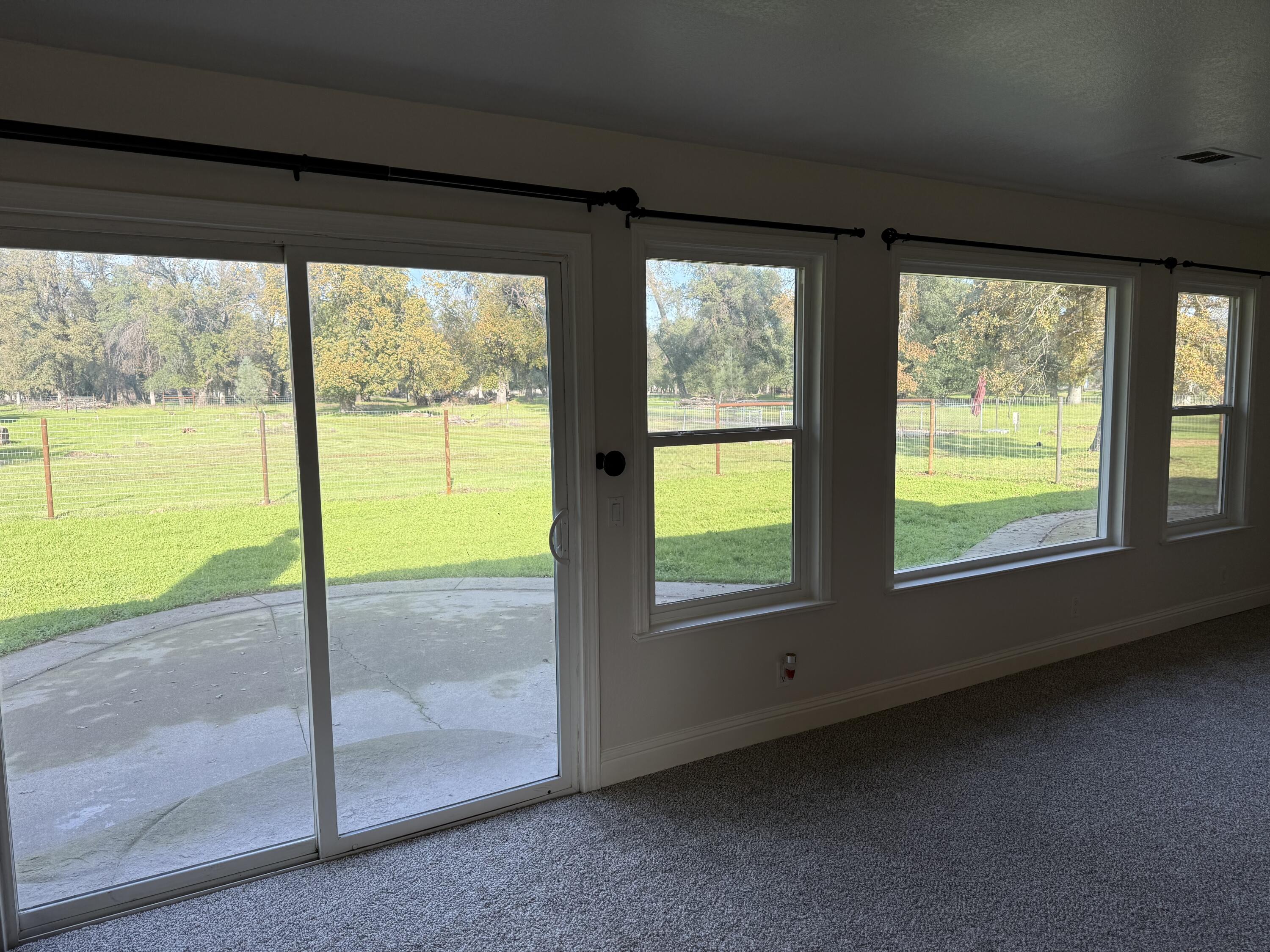 17140 Evergreen Road Cottonwood, CA 96022 - Photo 11 of 32 a view of an empty room and window
