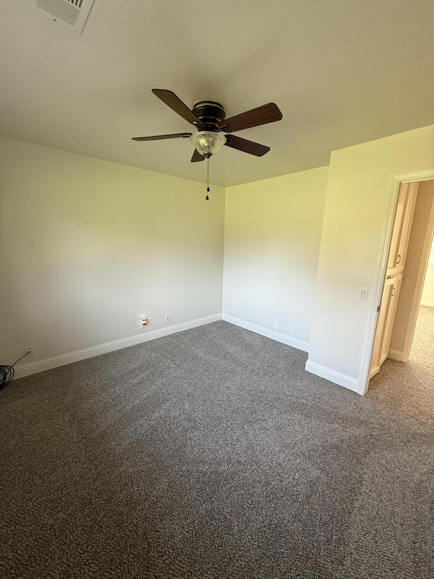17140 Evergreen Road Cottonwood, CA 96022 - Photo 16 of 32 a view of a big room with carpet