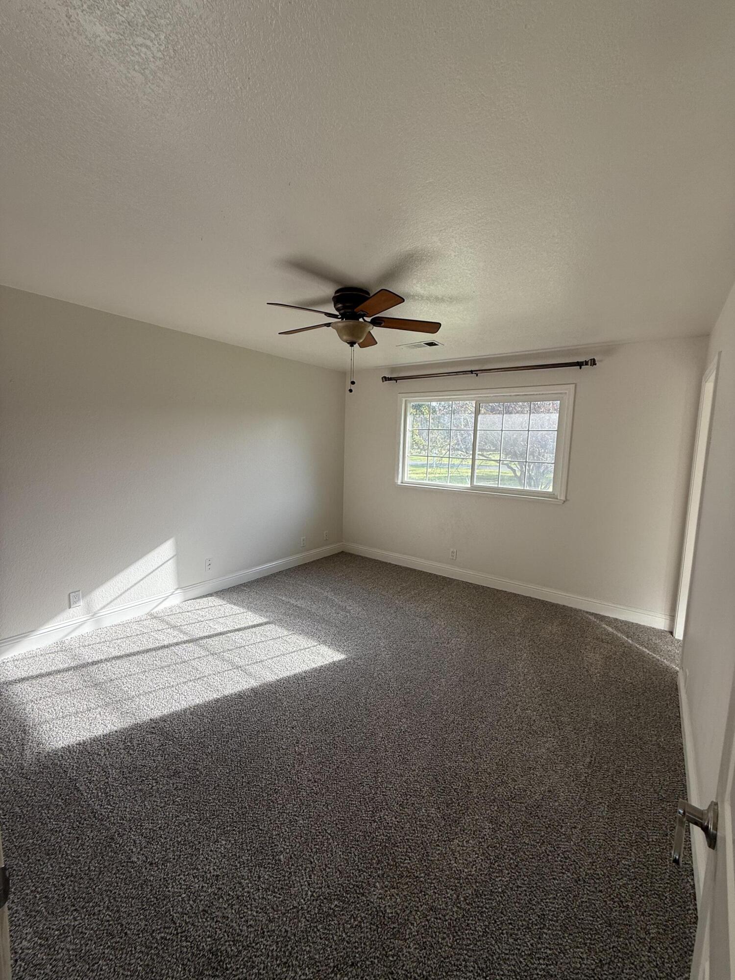 17140 Evergreen Road Cottonwood, CA 96022 - Photo 17 of 32 a view of an empty room with a window