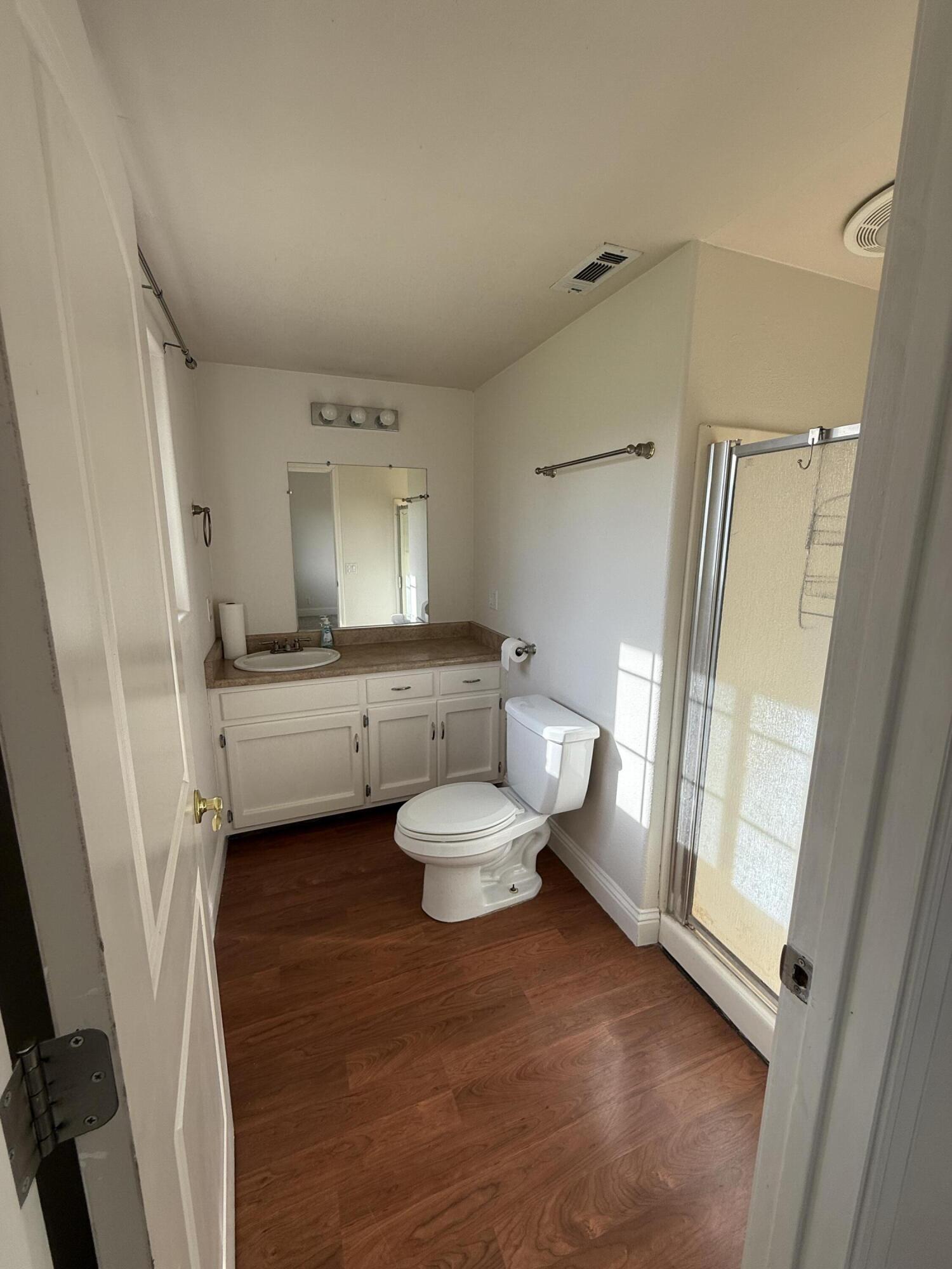 17140 Evergreen Road Cottonwood, CA 96022 - Photo 19 of 32 a bathroom with a sink toilet and shower