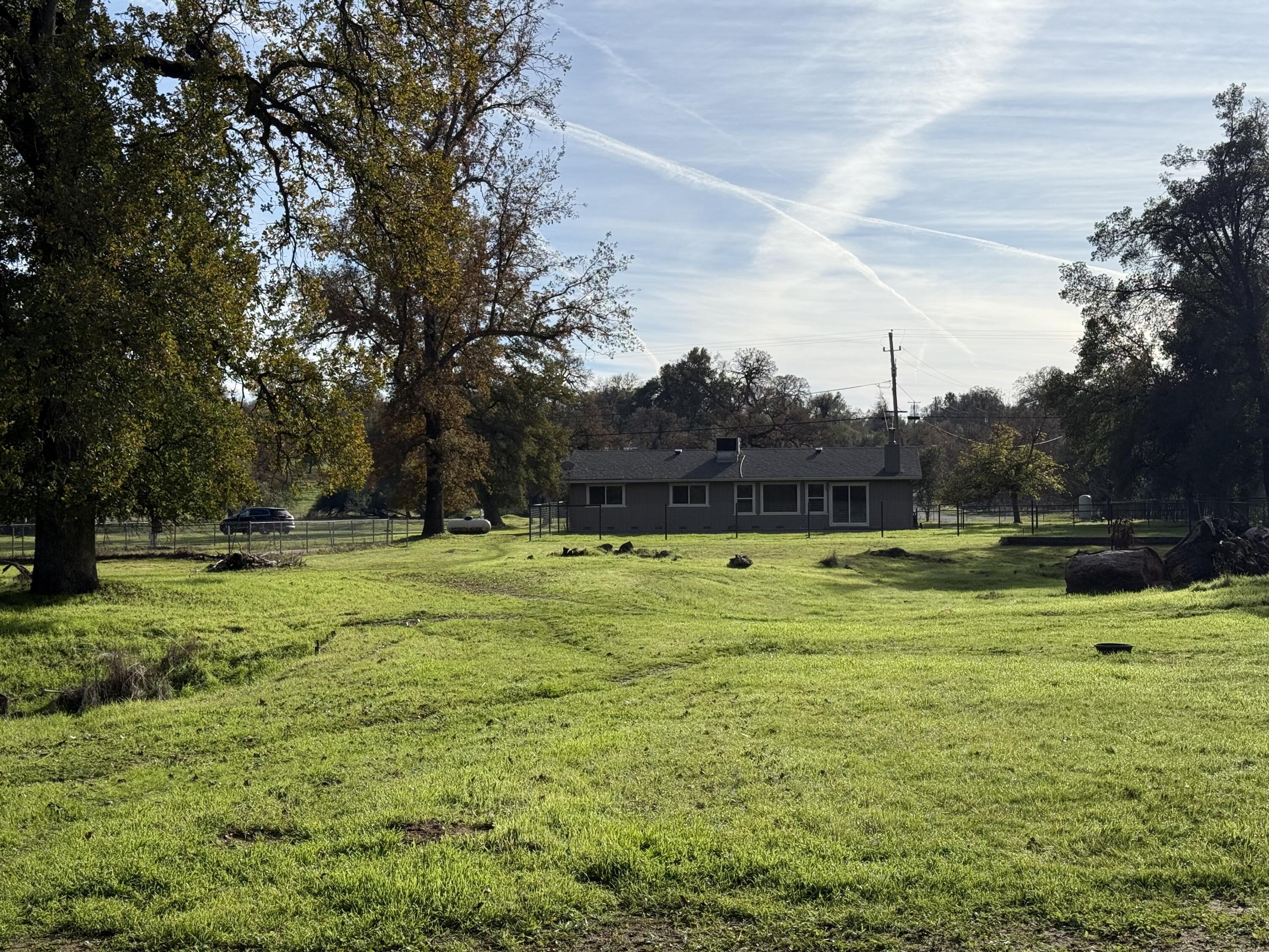 17140 Evergreen Road Cottonwood, CA 96022 - Photo 30 of 32 a view of a swimming pool with a yard
