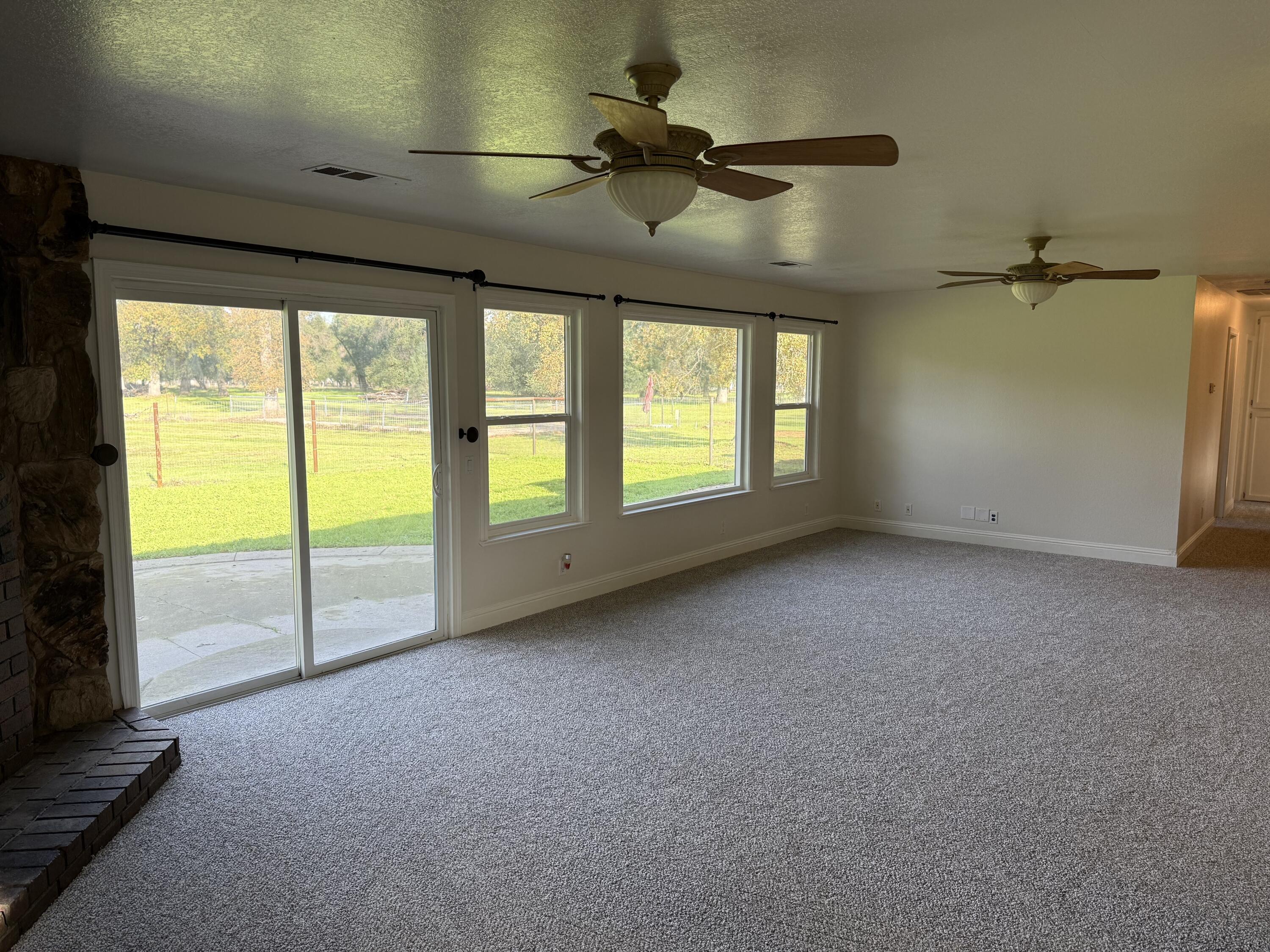 17140 Evergreen Road Cottonwood, CA 96022 - Photo 7 of 32 a view of an empty room with a window