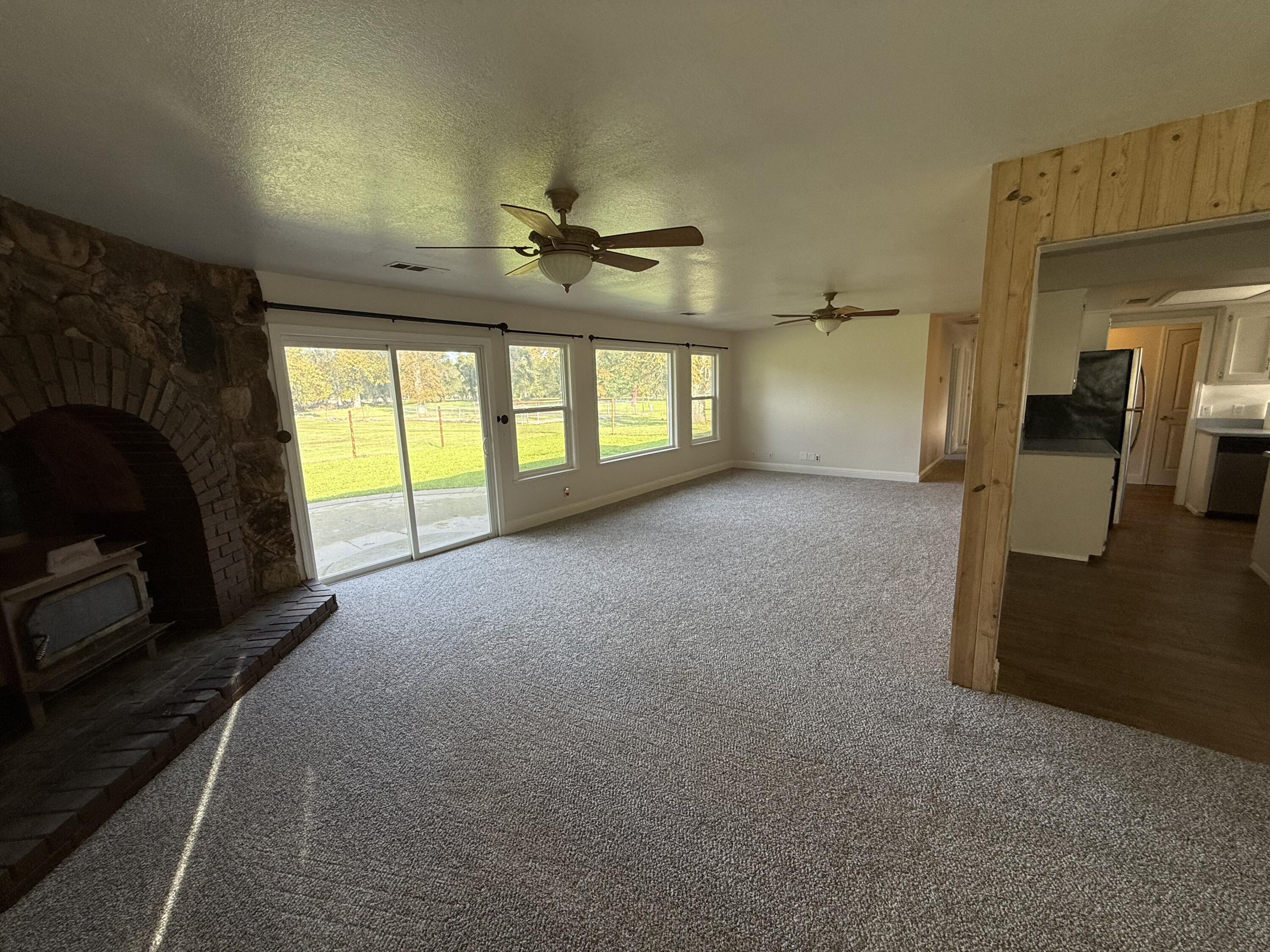 17140 Evergreen Road Cottonwood, CA 96022 - Photo 10 of 32 a view of empty room with windows
