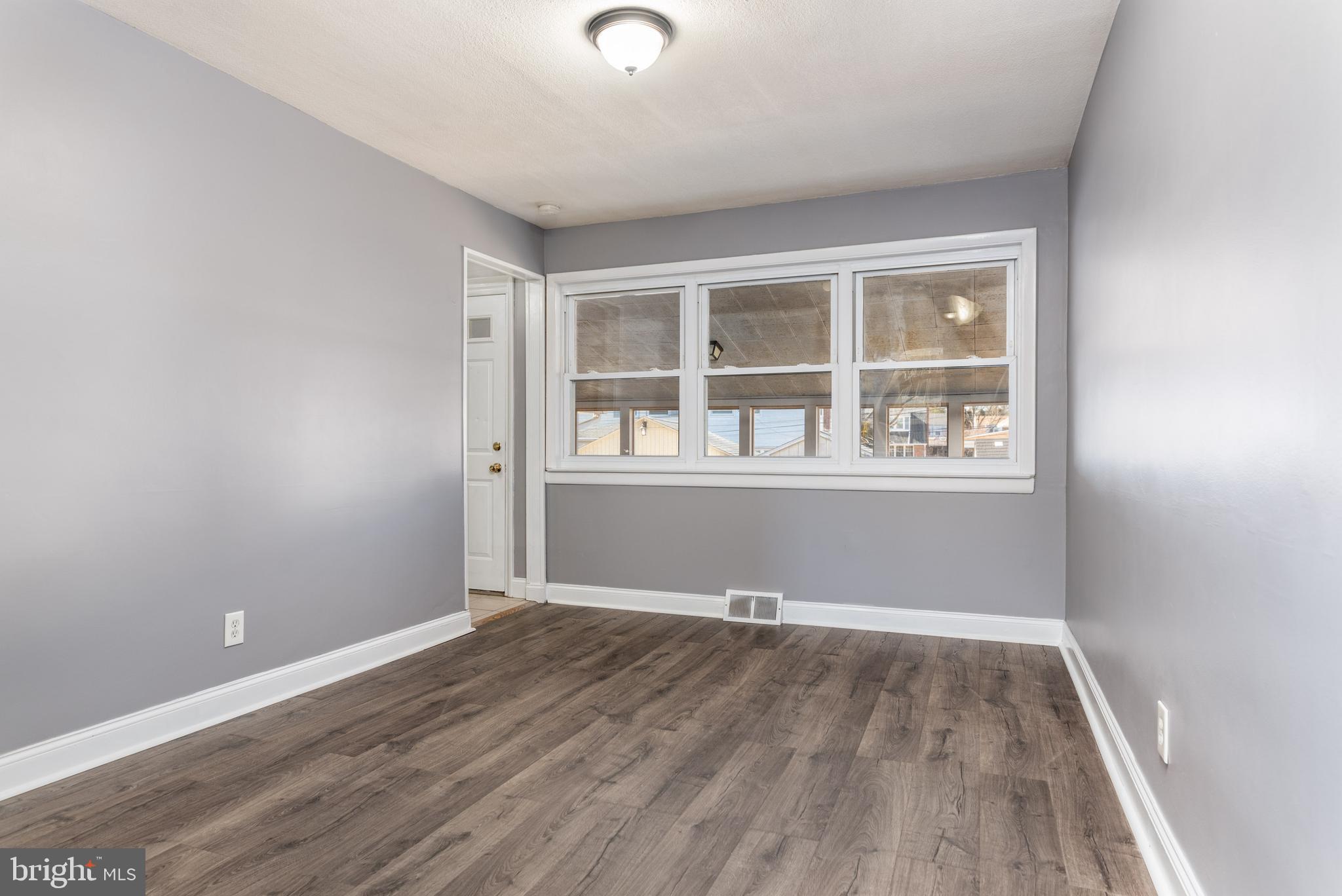 1423 Blackrock Road Swarthmore, PA 19081 - Photo 6 of 25 Dining Room Overlooks Sun Room