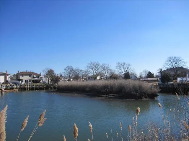 a view of a lake with houses