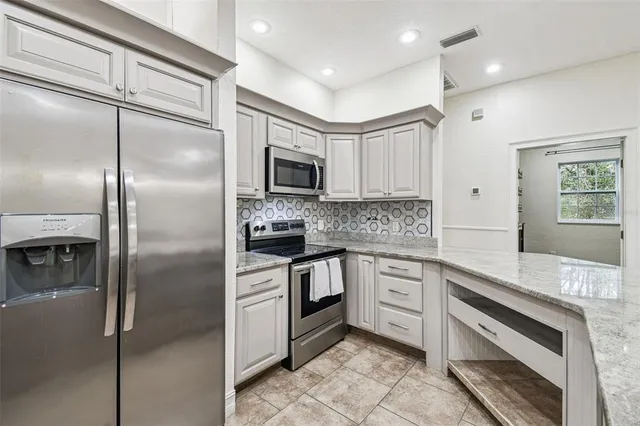 a view of an entryway with a room