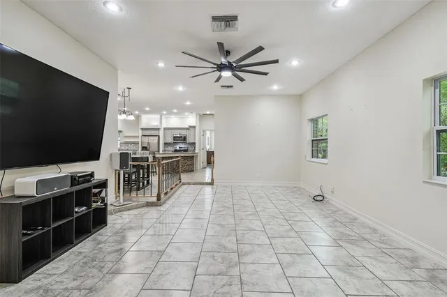 a view of a swimming pool with a sitting space