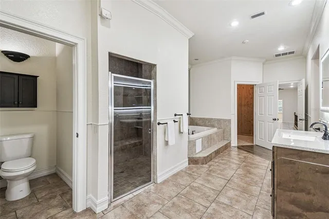 a view of a livingroom with an empty space and a flat screen tv