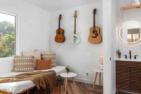 a bedroom with a bed and a table