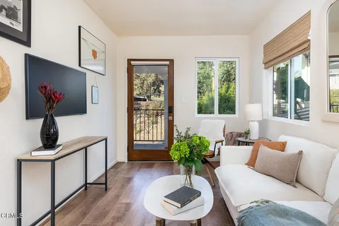 a kitchen with cabinets a sink and a stove