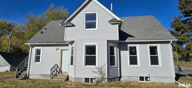 a view of a house with a garage