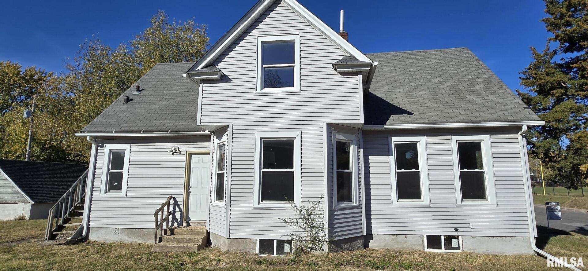 1600 9th Street Rock Island, IL 61201 - Photo 1 of 3 a view of a house with a garage