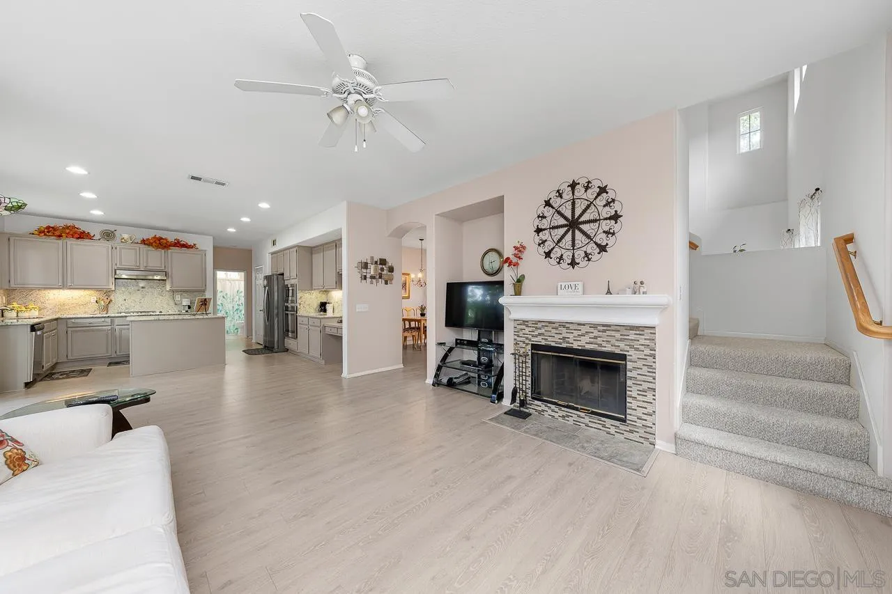 1559 Pleasanton Road Chula Vista, CA 91913 - Photo 15 of 41 a living room with furniture and a fireplace