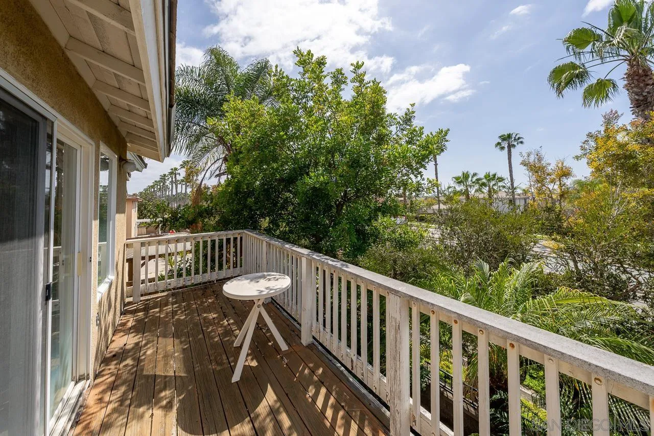 1559 Pleasanton Road Chula Vista, CA 91913 - Photo 20 of 41 a view of balcony with wooden floor and fence