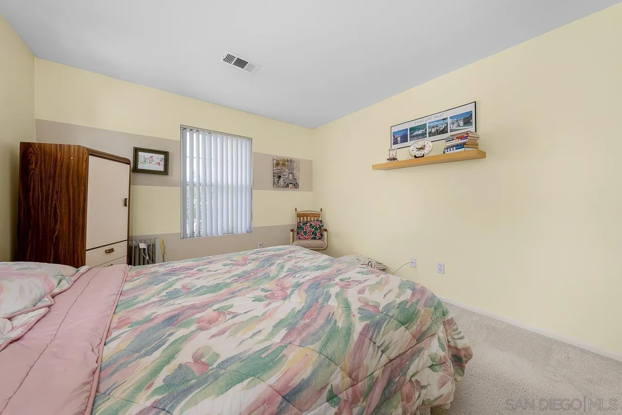 1559 Pleasanton Road Chula Vista, CA 91913 - Photo 28 of 41 a bedroom with a bed and a dresser