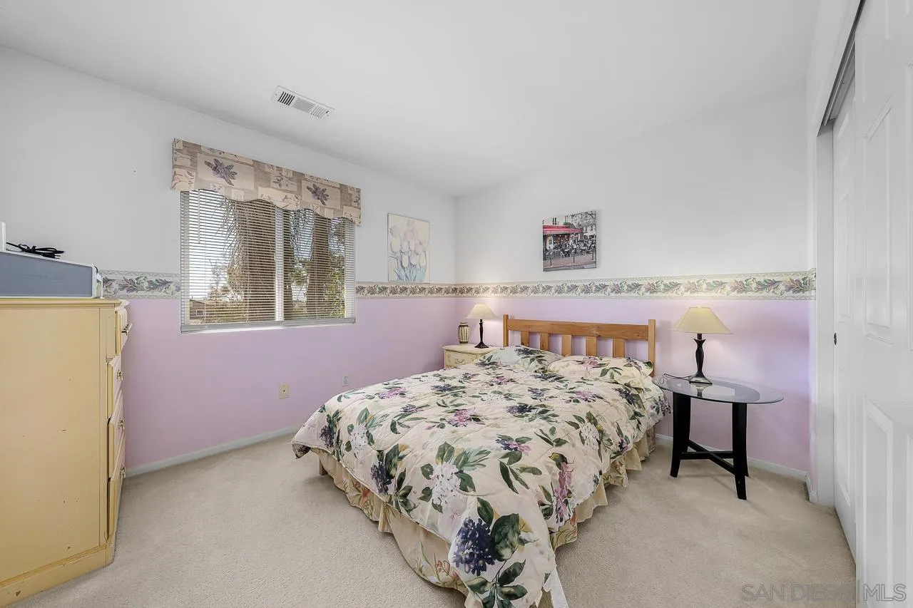 1559 Pleasanton Road Chula Vista, CA 91913 - Photo 29 of 41 a bedroom with a bed and a window
