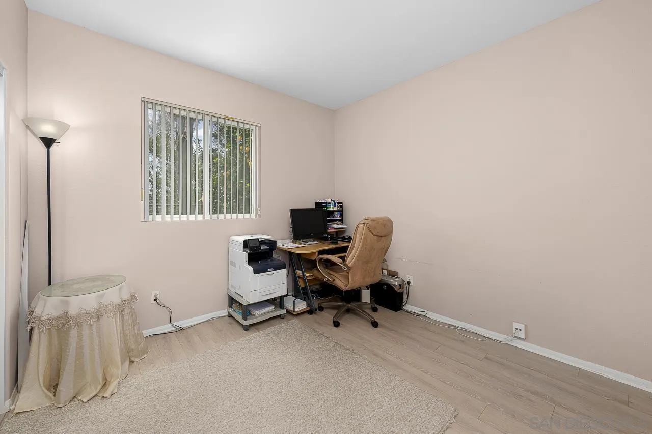 1559 Pleasanton Road Chula Vista, CA 91913 - Photo 32 of 41 a view of a workspace with furniture and a window