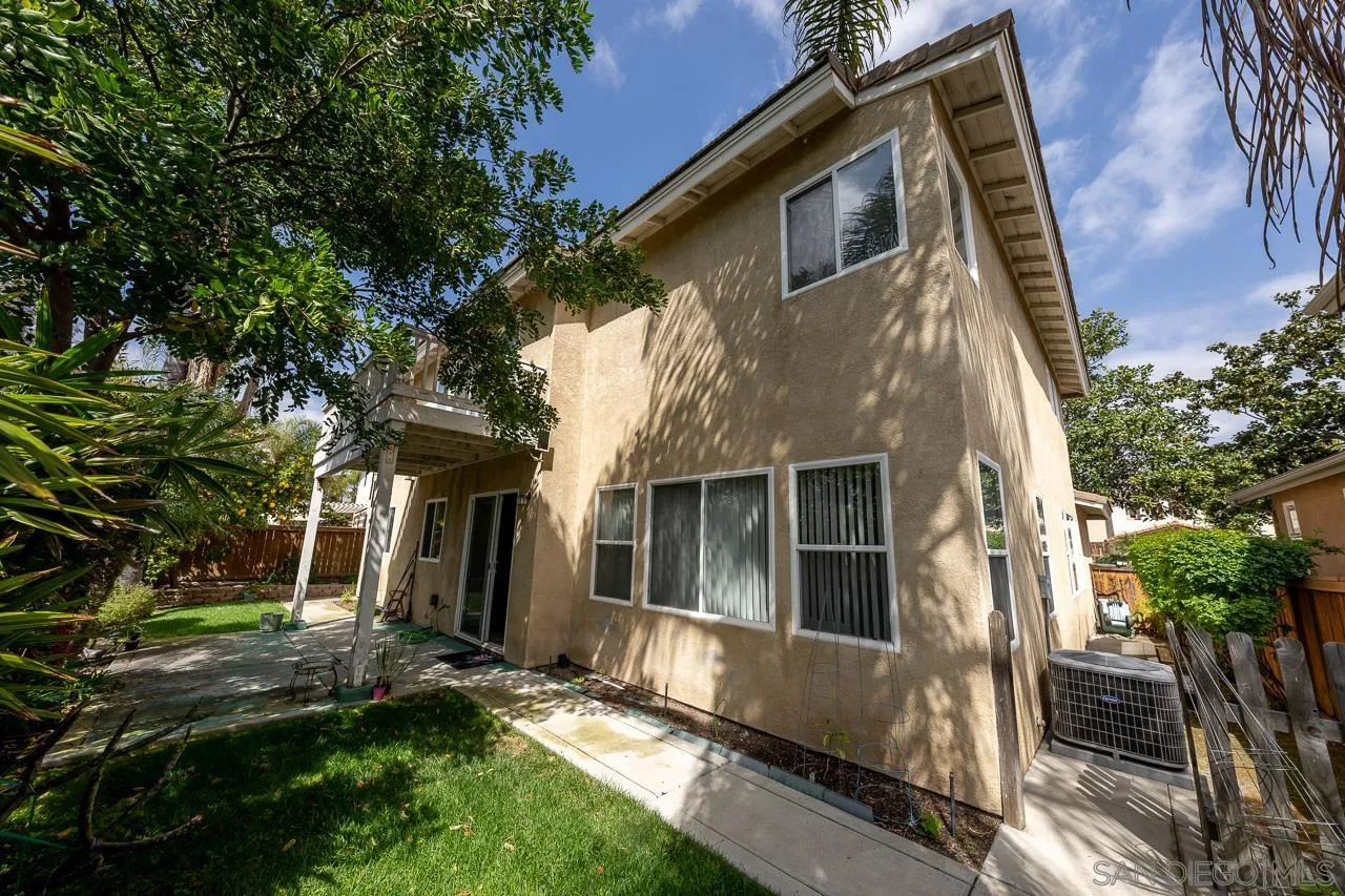 1559 Pleasanton Road Chula Vista, CA 91913 - Photo 37 of 41 a view of a house with a yard