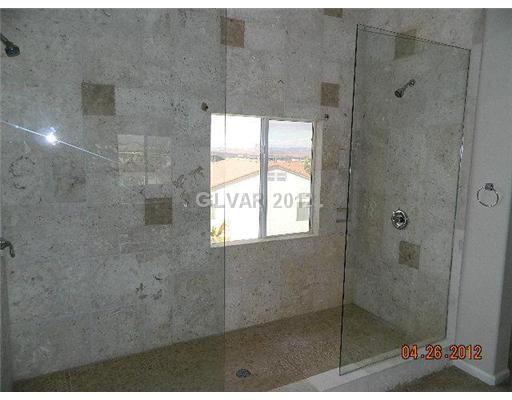 644 Tyler Ridge Avenue Henderson, NV 89012 - Photo 16 of 25 Master Bath/Spa. DUAL SHOWERS IN THIS HUGE MASTER BATHROOM SHOWER WITH GREAT VIEW FROM THE WINDOW!