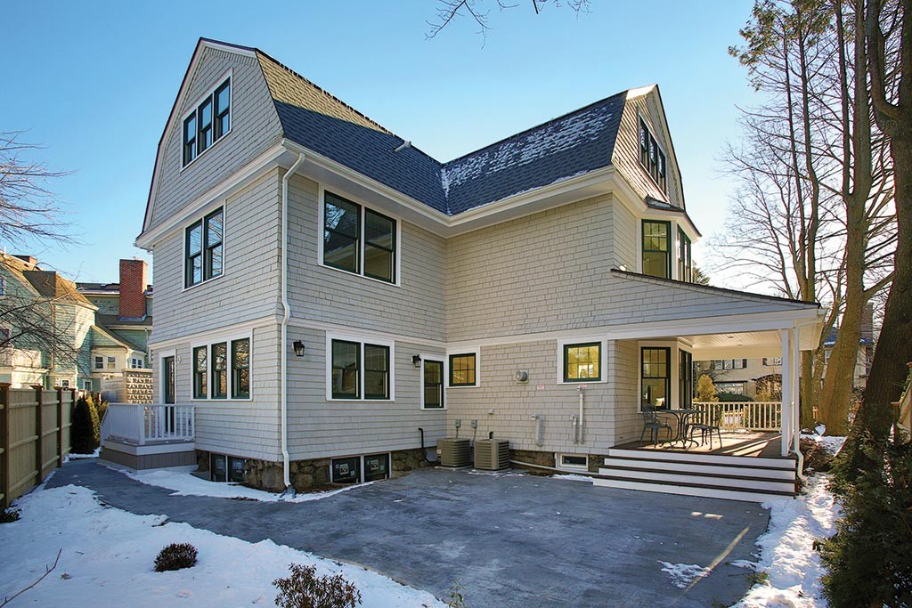 85 Dean Road Brookline, MA 02445 - Photo 12 of 12 a front view of a house with a yard