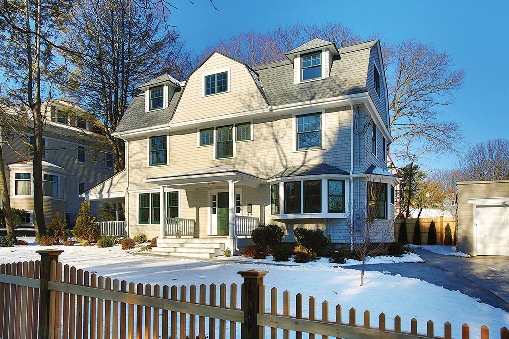 85 Dean Road Brookline, MA 02445 - Photo 2 of 12 a front view of a residential apartment building with a yard