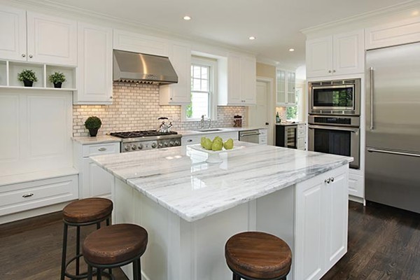 85 Dean Road Brookline, MA 02445 - Photo 8 of 12 a kitchen with a sink a stove a refrigerator and a refrigerator