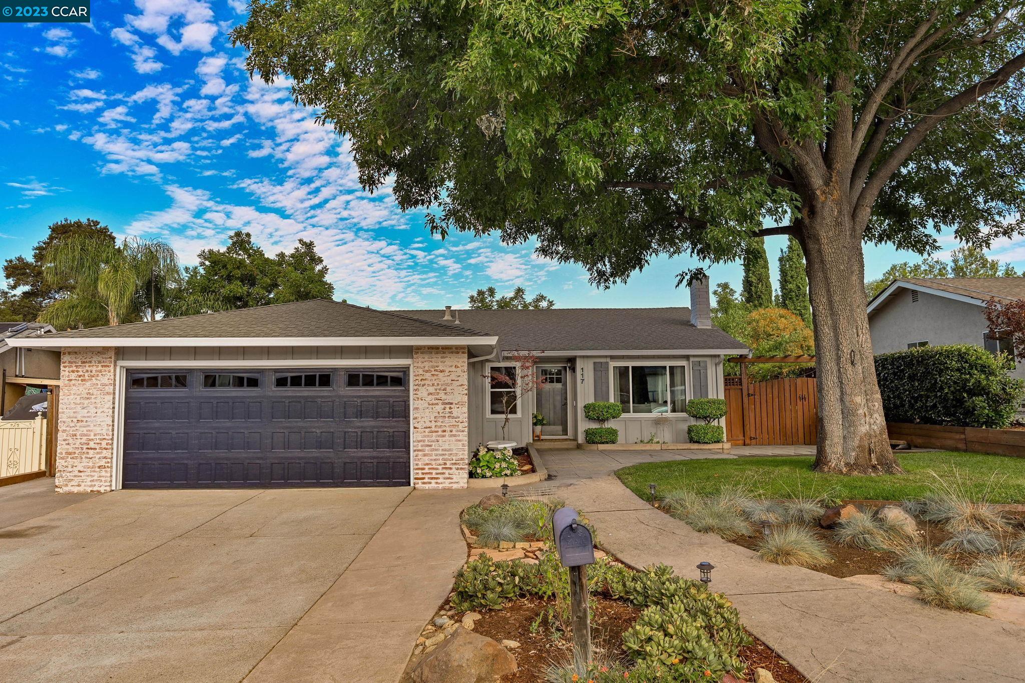 front view of house with a yard