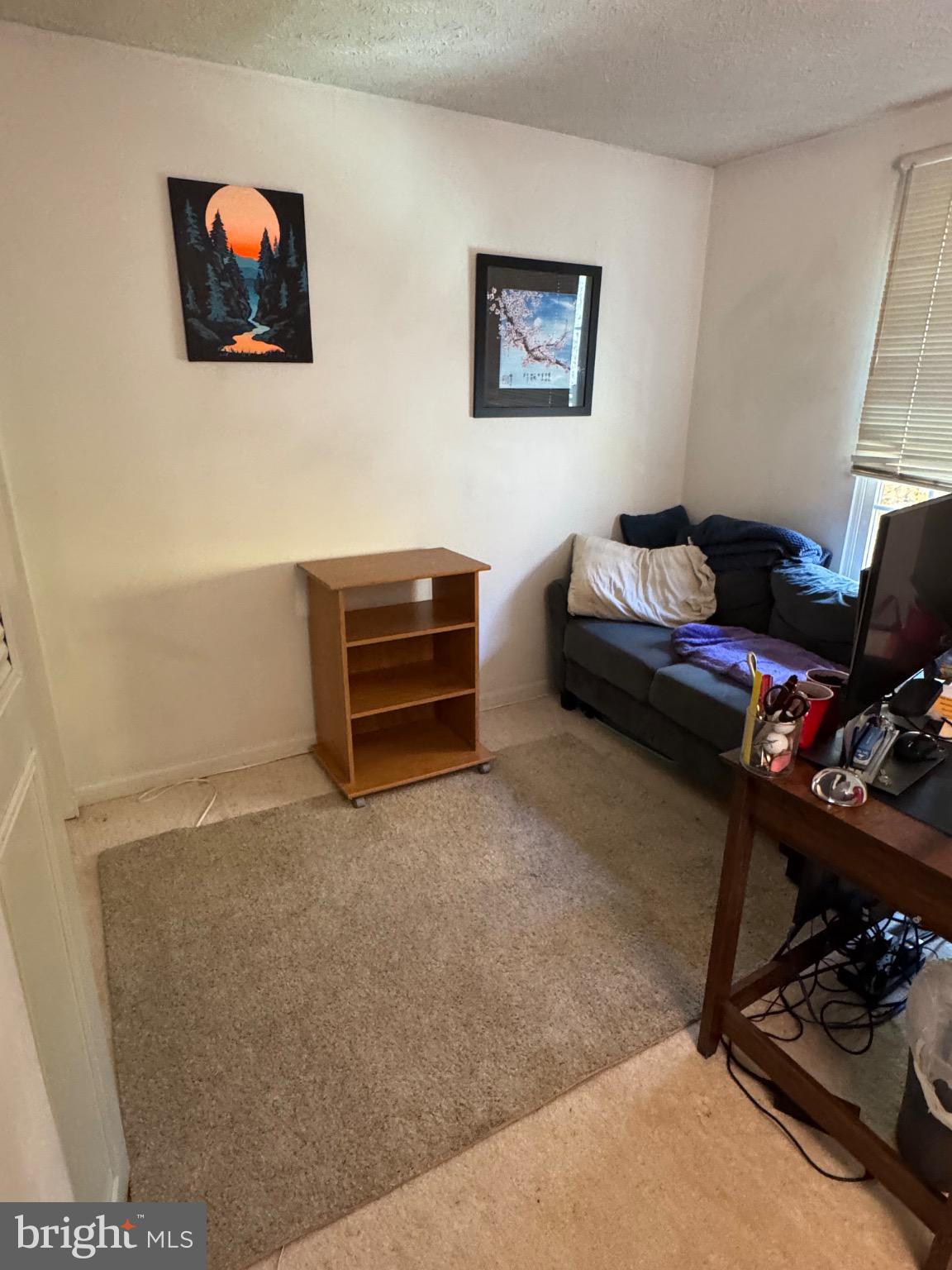 1565 Autumn Ridge Circle Reston, VA 20194 - Photo 13 of 19 a bedroom with furniture and a window