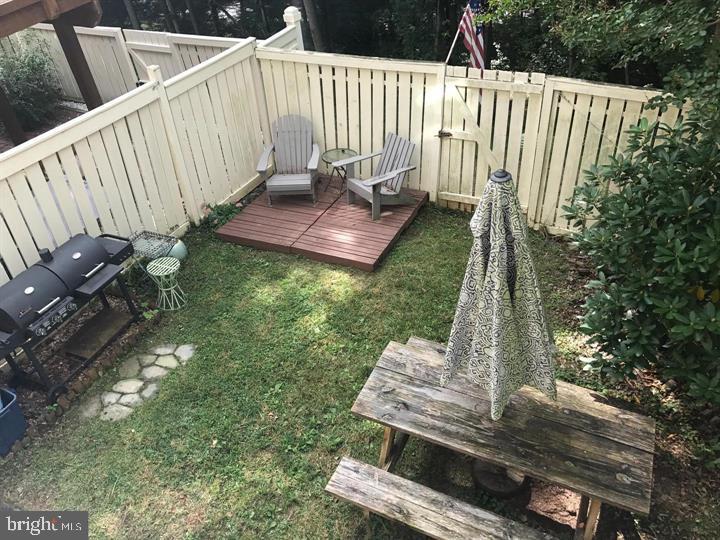 1565 Autumn Ridge Circle Reston, VA 20194 - Photo 18 of 19 a view of a chairs setting in back yard of a park