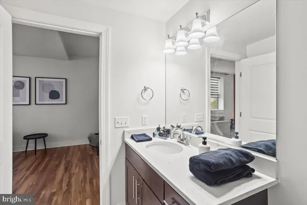 a bedroom with a bed and a chair