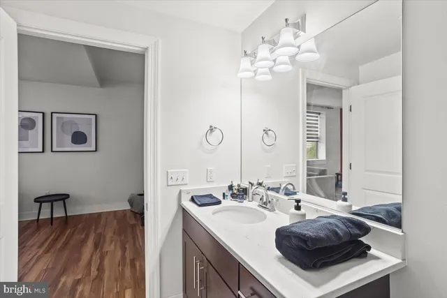 a bedroom with a bed and a chair