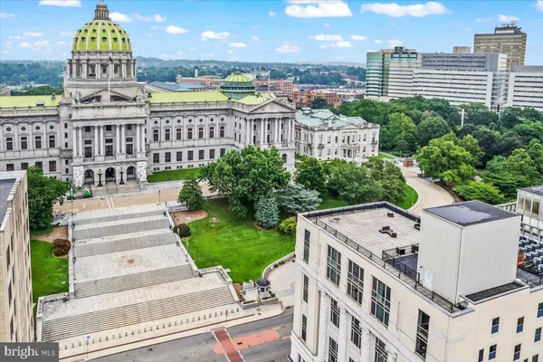 a view of a city with tall buildings