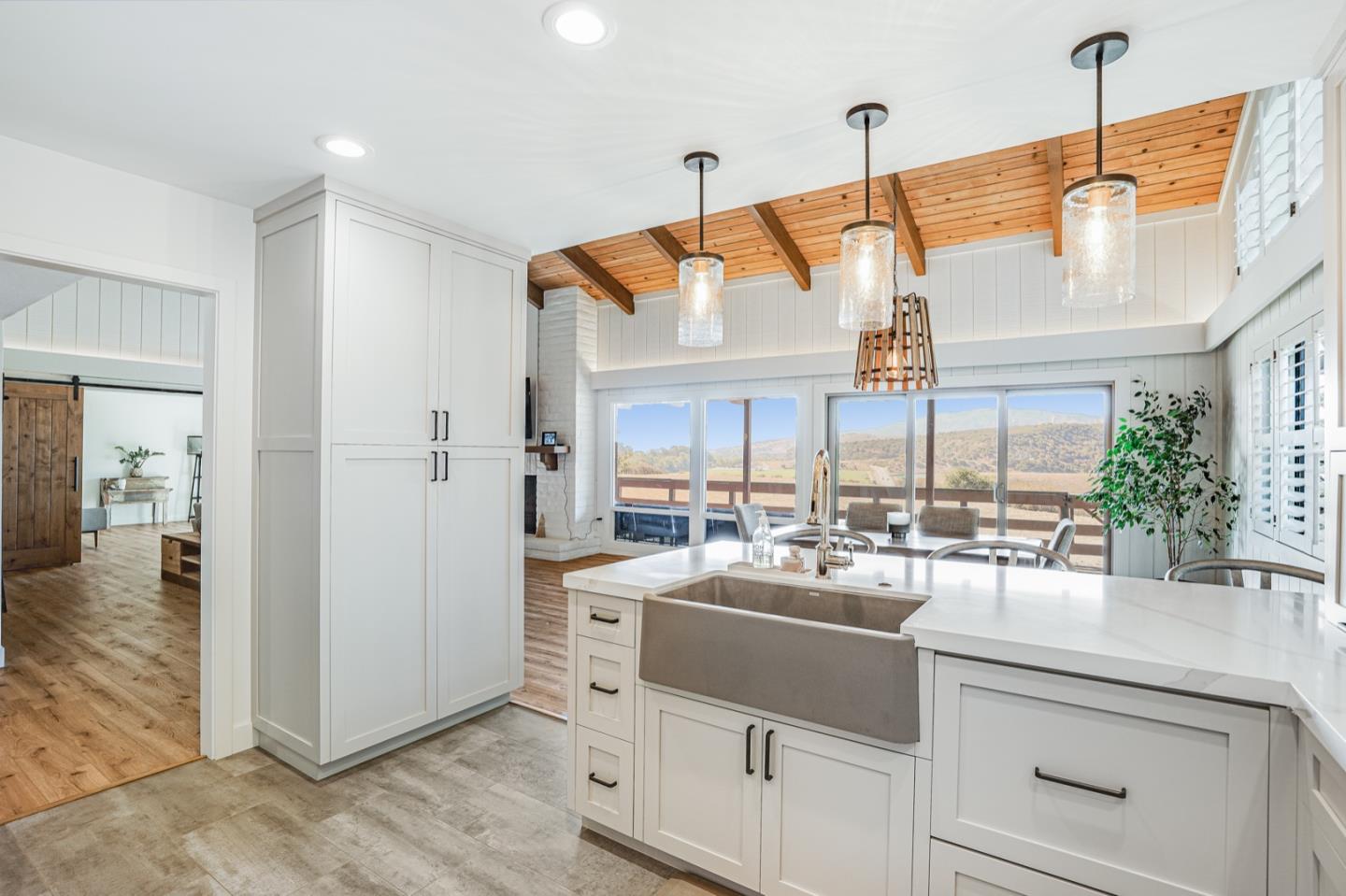 14150 Reservation Road Salinas, CA 93908 - Photo 13 of 47 a very nice looking room with a large window and chandelier