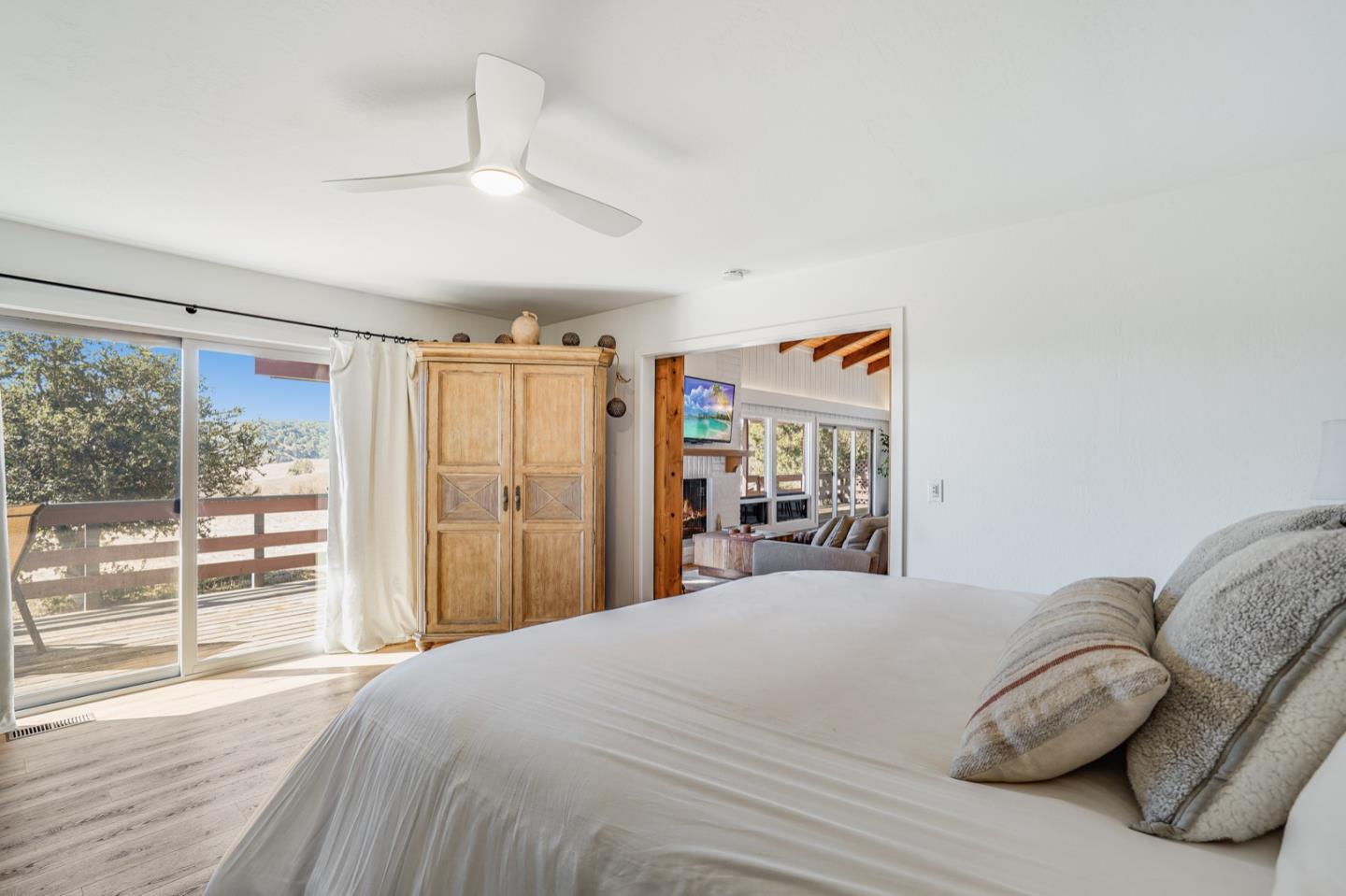 14150 Reservation Road Salinas, CA 93908 - Photo 19 of 47 a bedroom with a large bed and a large window