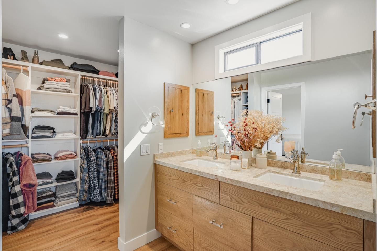 14150 Reservation Road Salinas, CA 93908 - Photo 22 of 47 a bathroom with a double vanity sink and a mirror