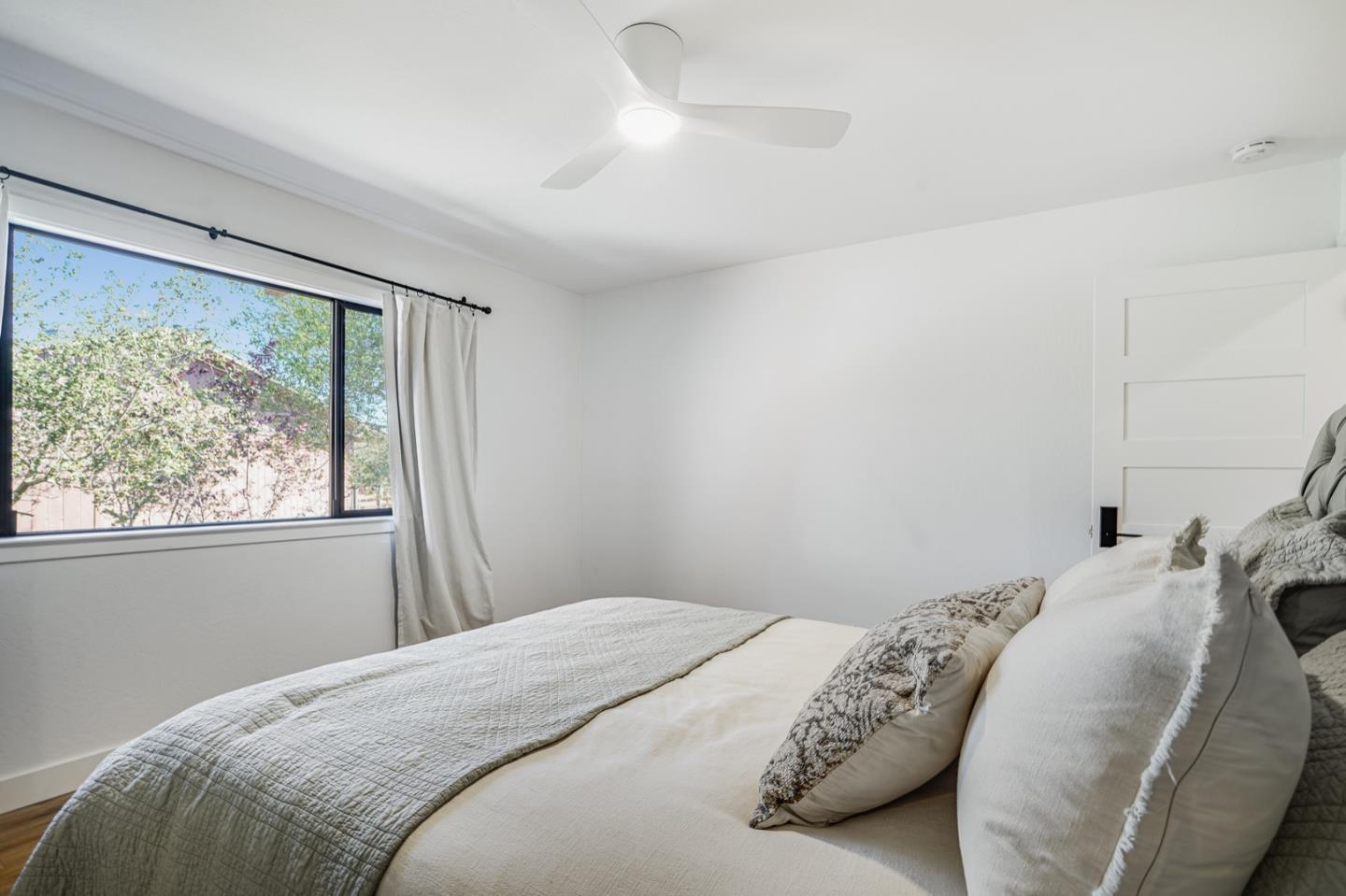 14150 Reservation Road Salinas, CA 93908 - Photo 26 of 47 a bedroom with a bed and a window