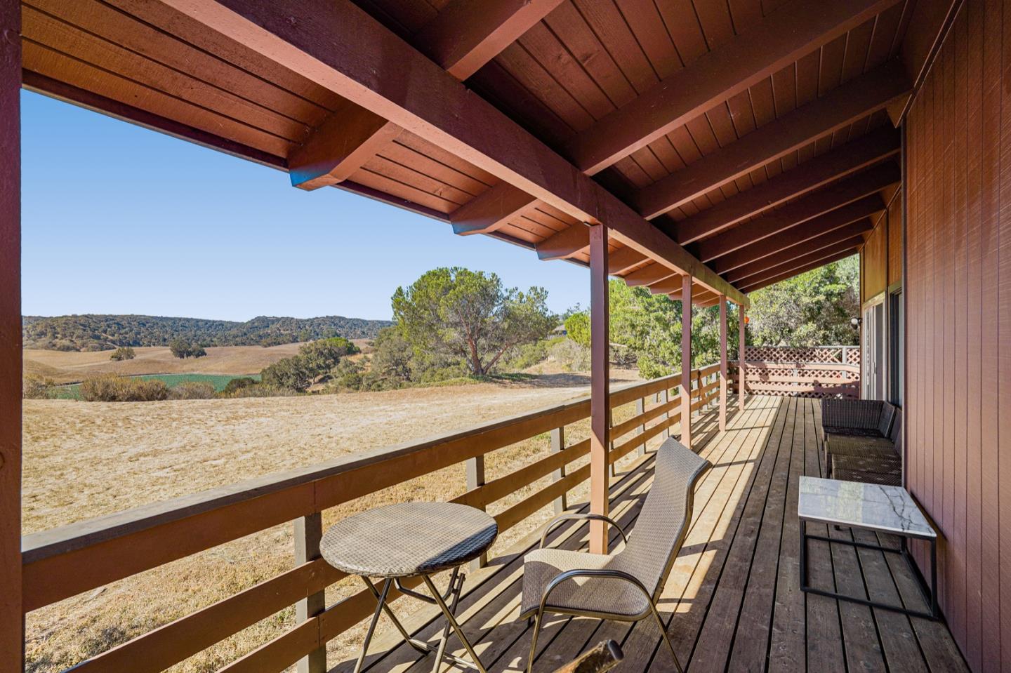 14150 Reservation Road Salinas, CA 93908 - Photo 35 of 47 a view of balcony with mountain view and wooden floor