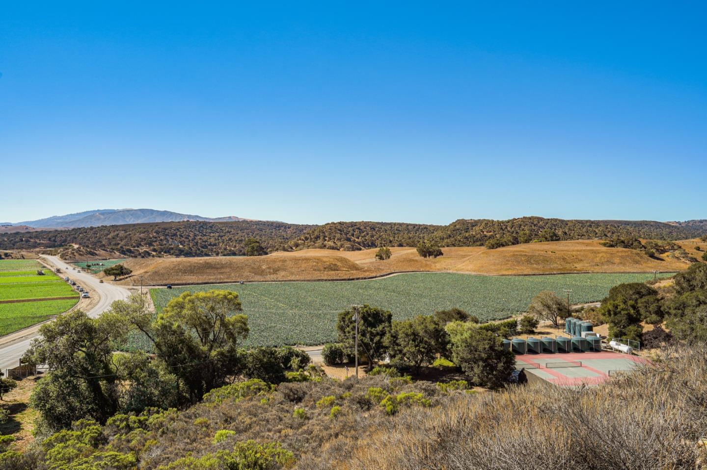 14150 Reservation Road Salinas, CA 93908 - Photo 45 of 47 a view of a lake with a mountain in the background