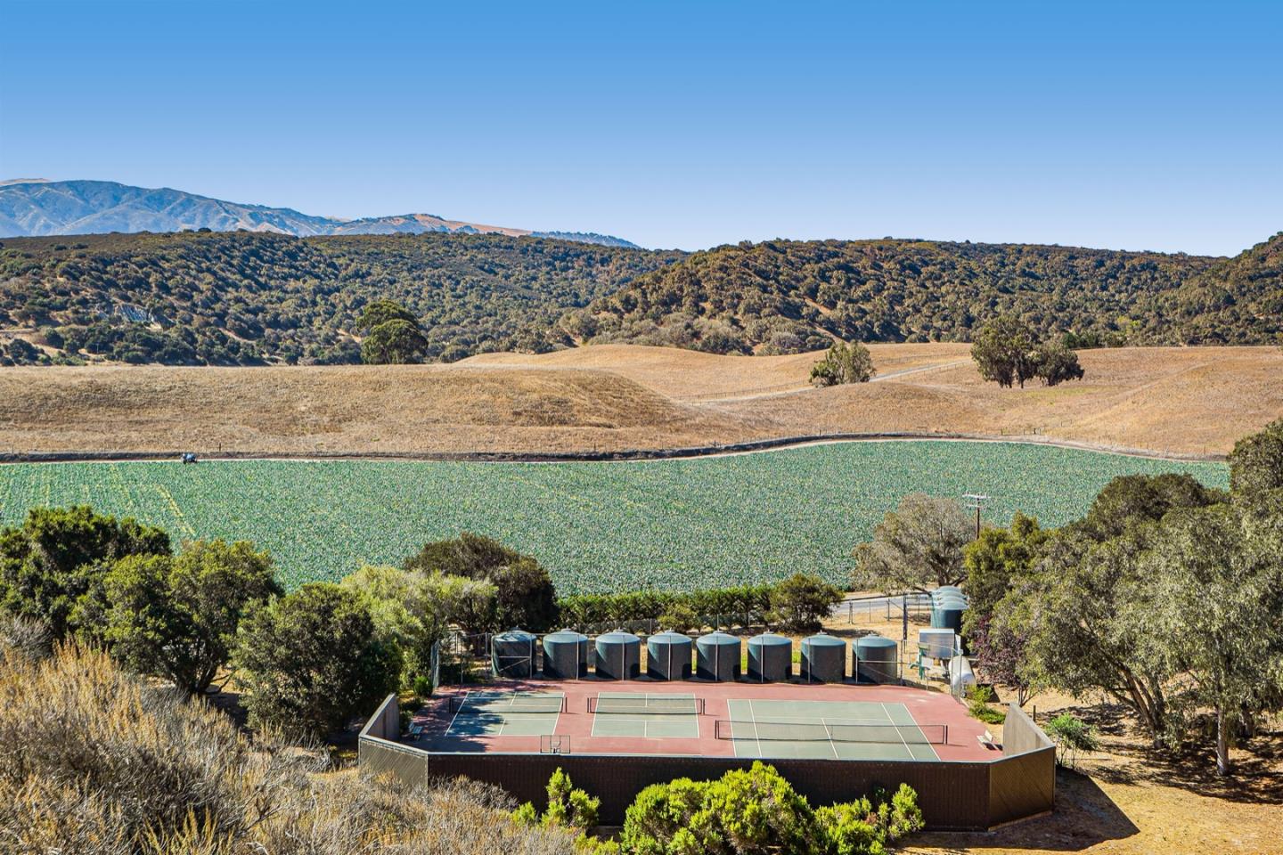 14150 Reservation Road Salinas, CA 93908 - Photo 46 of 47 a view of a lake with a mountain in the background