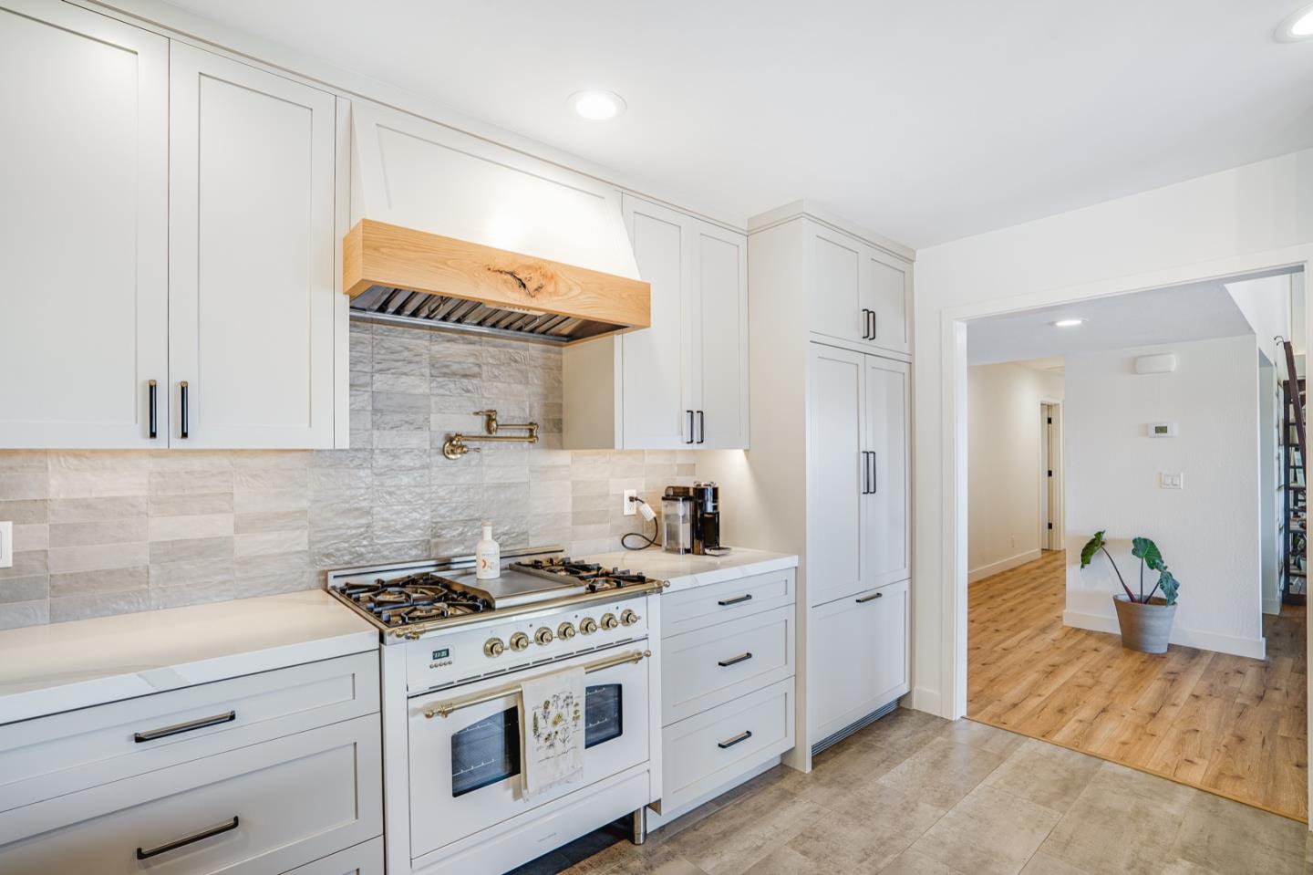 14150 Reservation Road Salinas, CA 93908 - Photo 10 of 47 a kitchen with cabinets and appliances