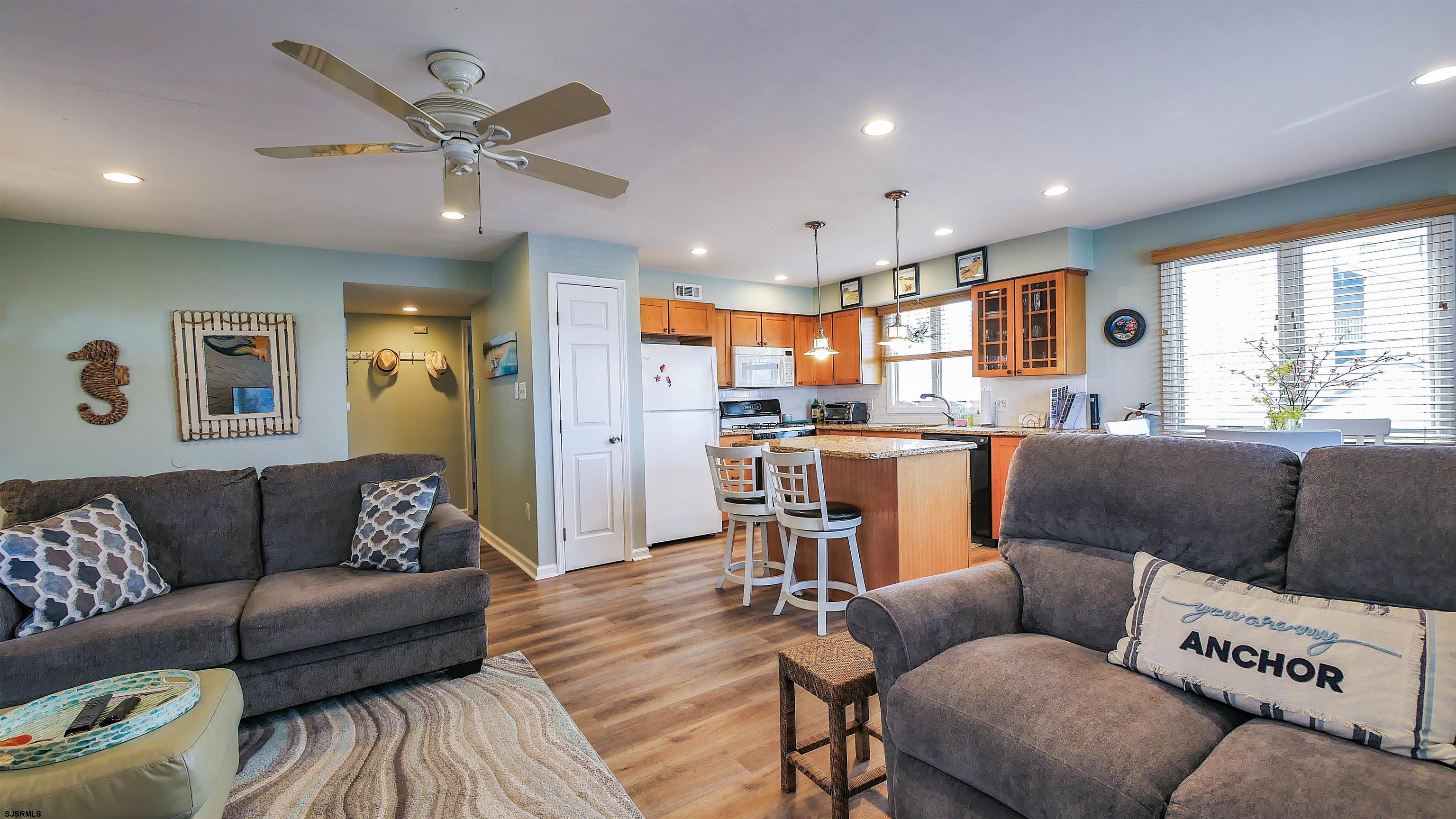 4318 West Brigantine Avenue, Unit D1 Brigantine, NJ 08203 - Photo 3 of 30 a living room with furniture and a large window