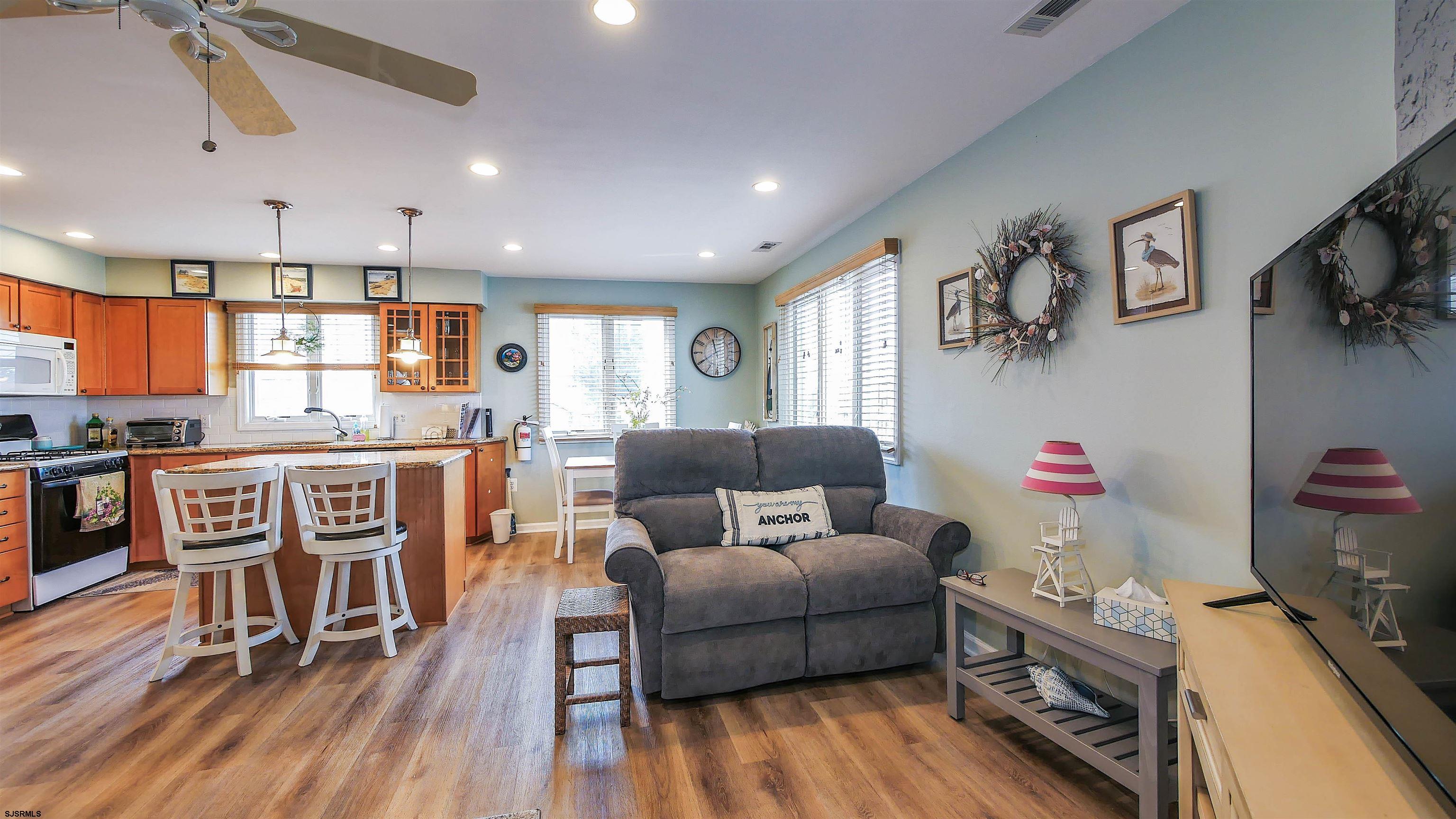 4318 West Brigantine Avenue, Unit D1 Brigantine, NJ 08203 - Photo 5 of 30 a living room with furniture and wooden floor