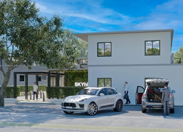 a car parked in front of a house