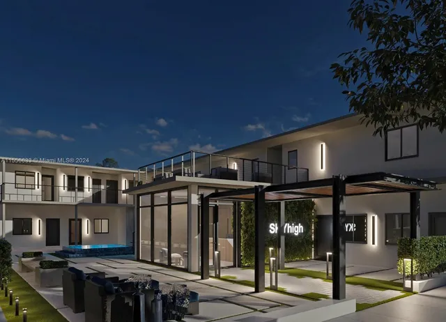 a front view of a building with street view