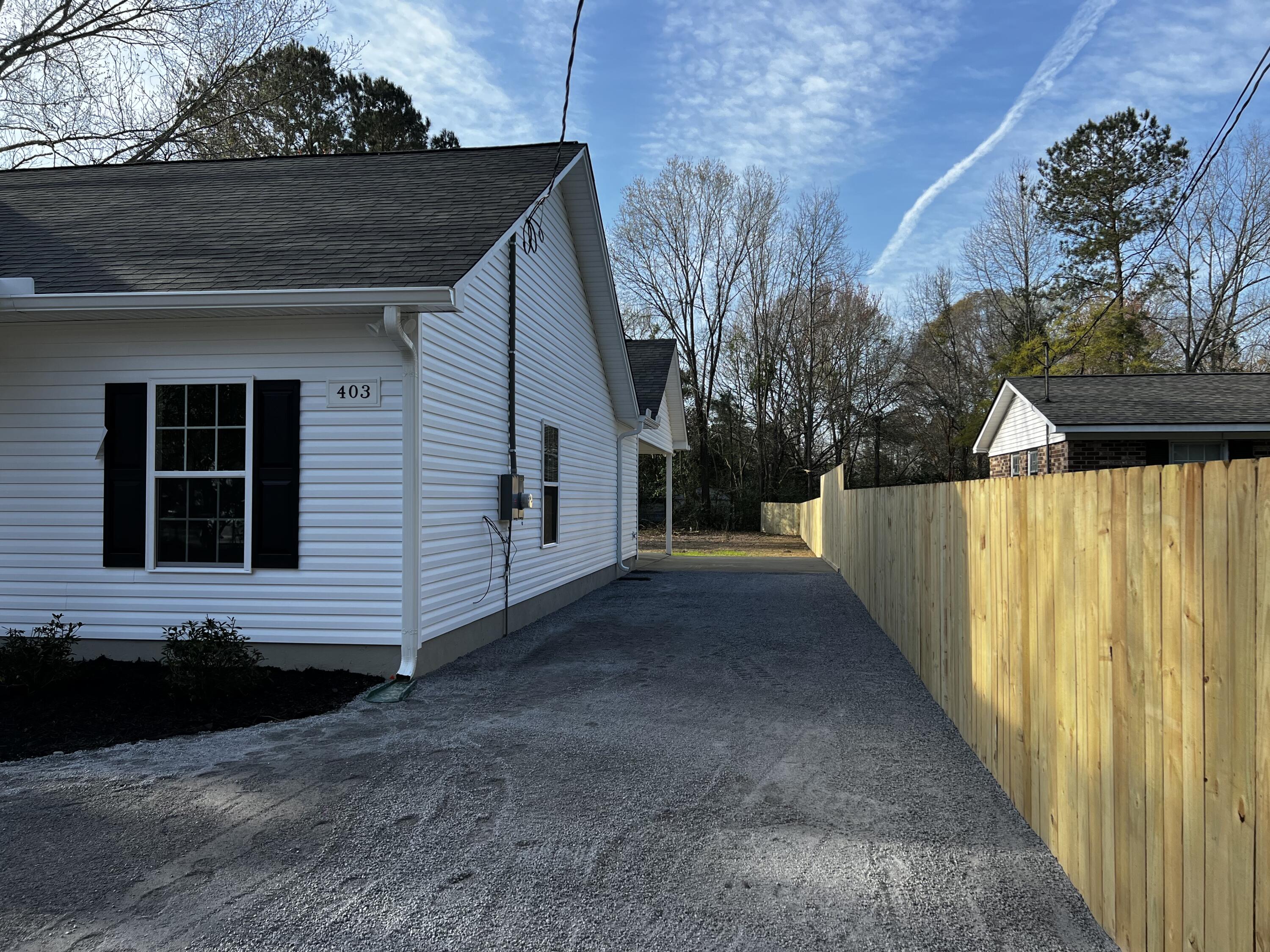 403 Berkeley Drive Moncks Corner, SC 29461 - Photo 4 of 31 Driveway to Rear