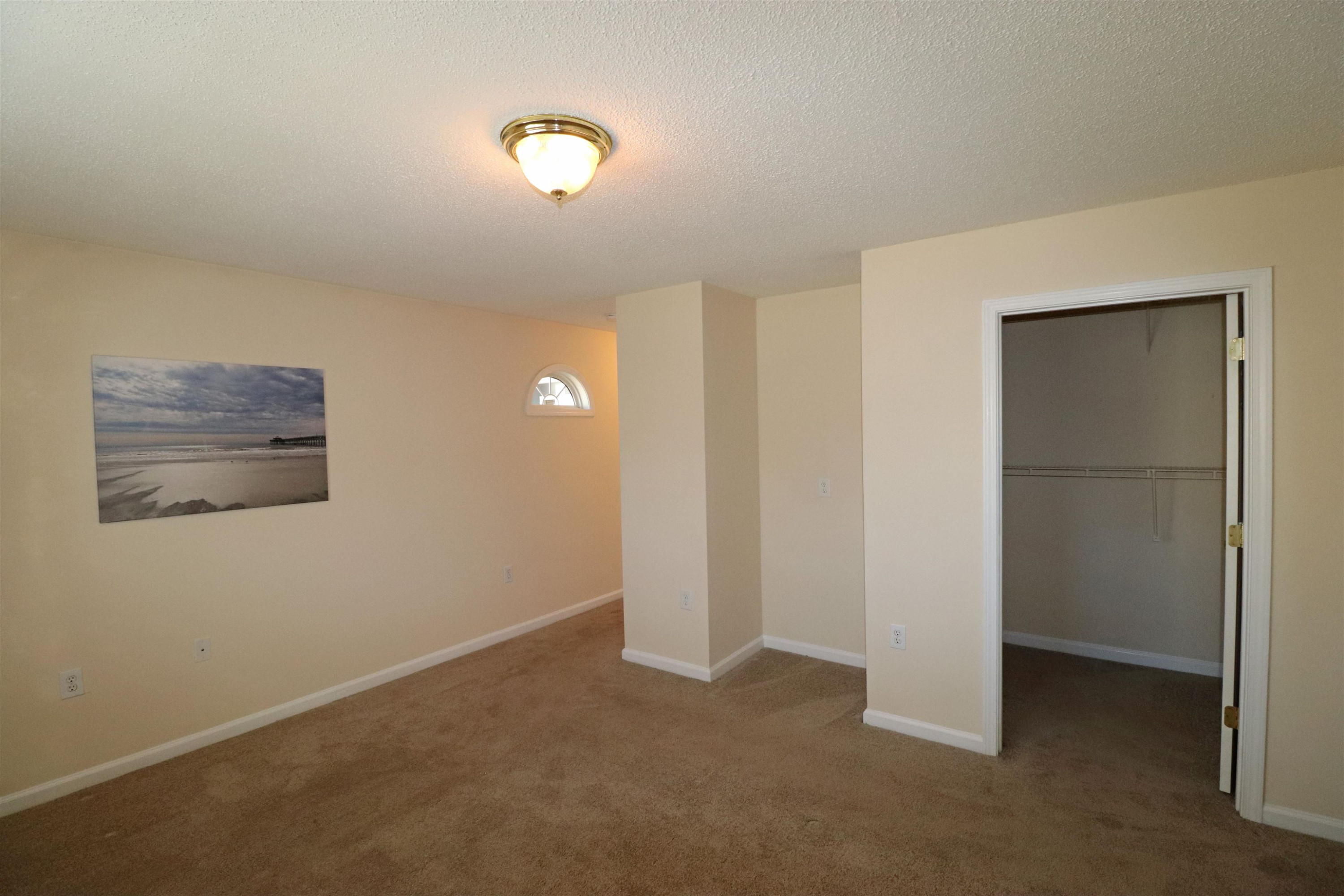 11371 Involute Place, Unit 103 Raleigh, NC 27617 - Photo 14 of 34 a view of an empty room