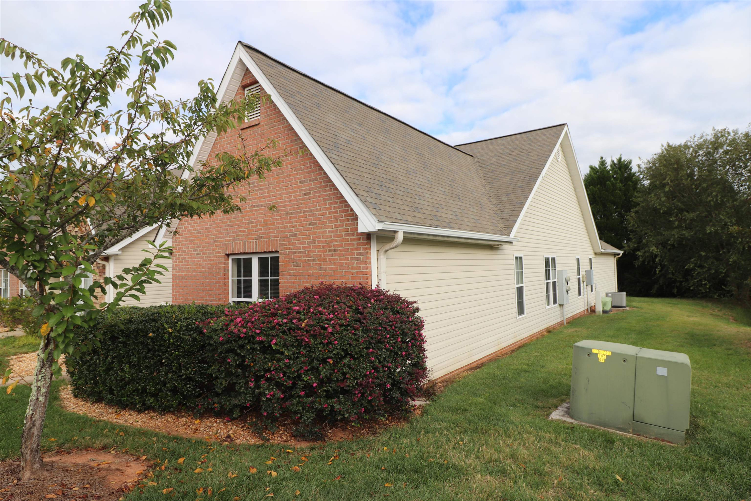 11371 Involute Place, Unit 103 Raleigh, NC 27617 - Photo 32 of 34 a view of backyard of house and trees around