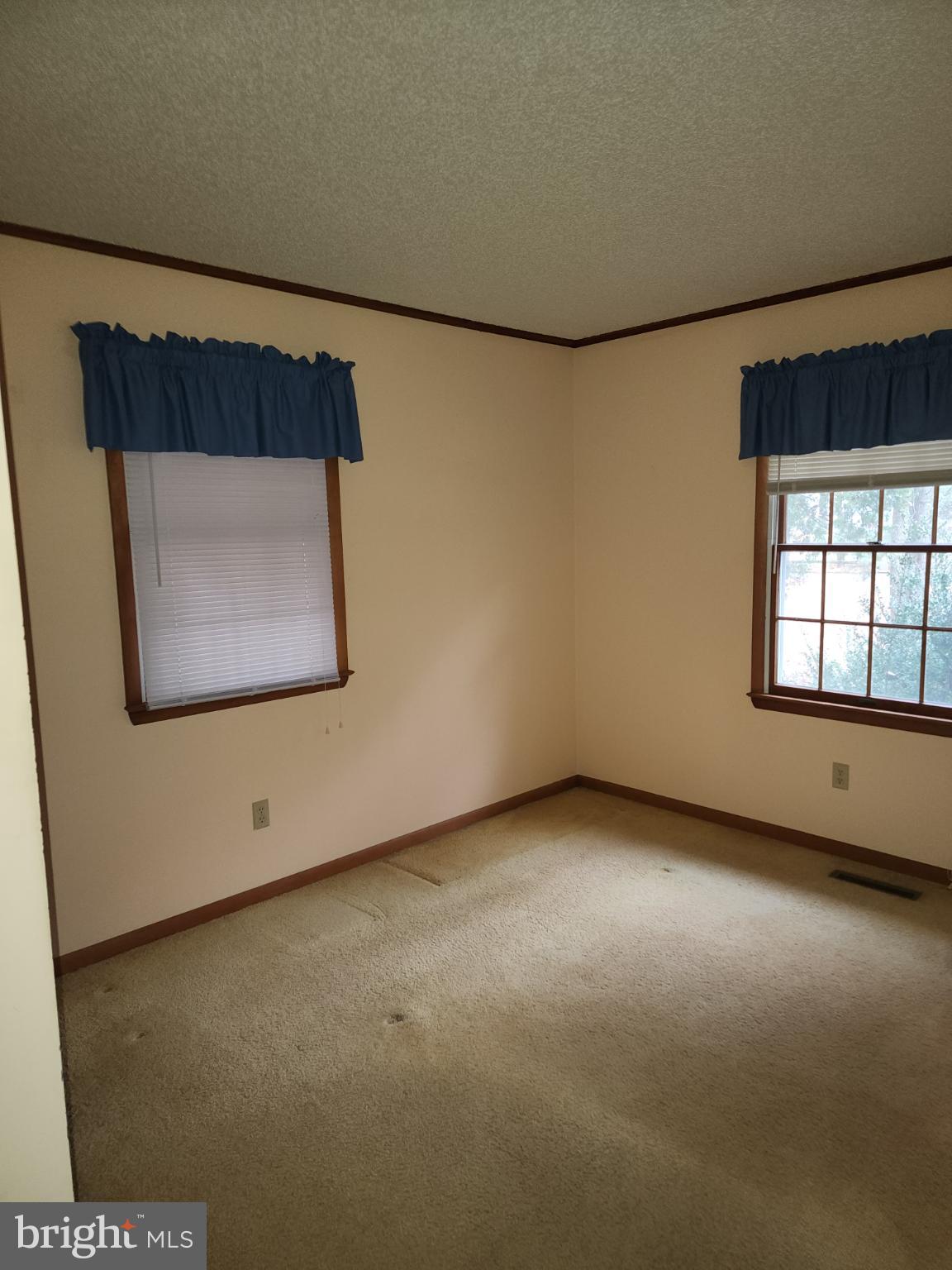 9310 Romancoke Road Stevensville, MD 21666 - Photo 26 of 35 a view of an empty room with a window