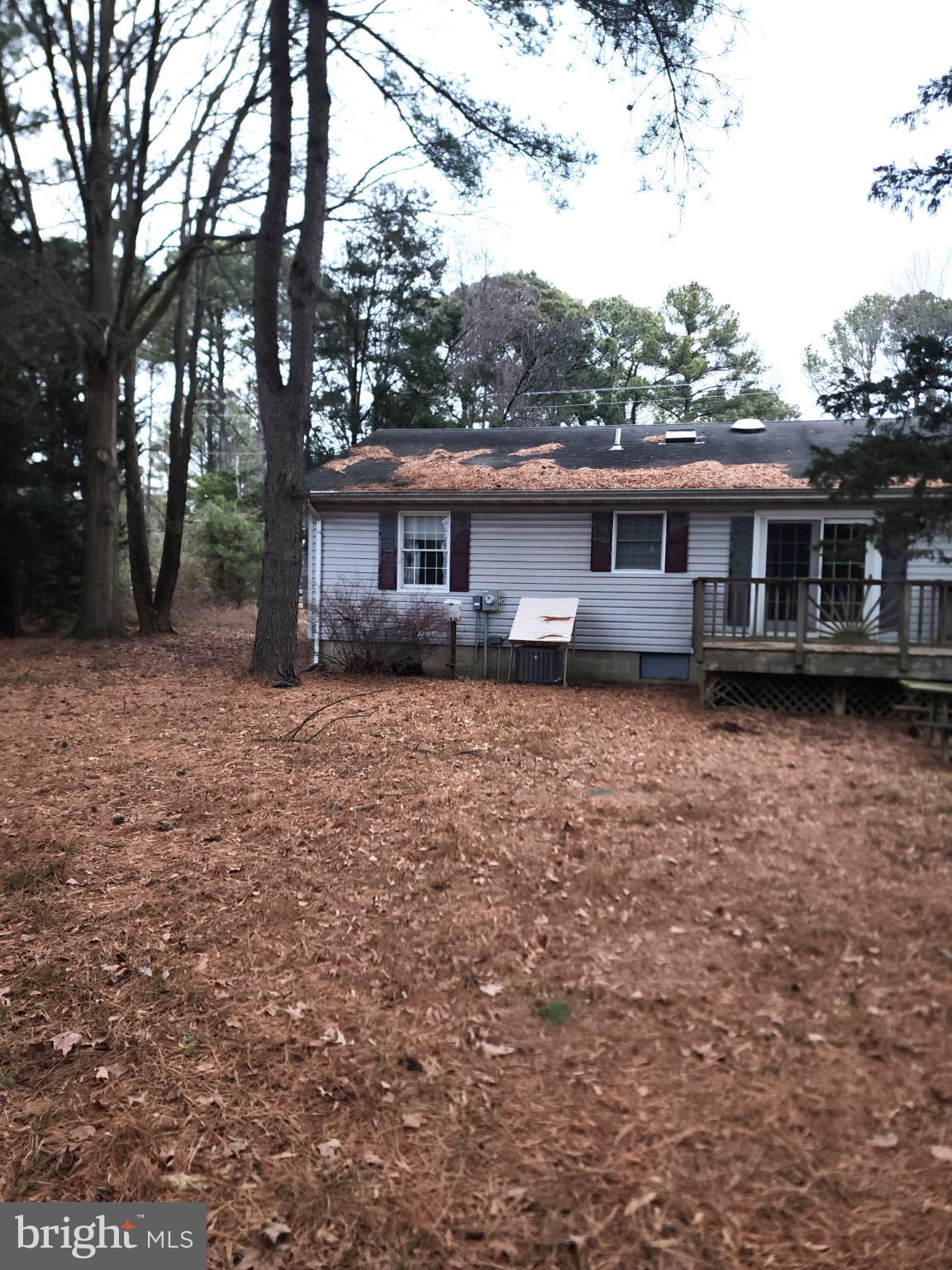 9310 Romancoke Road Stevensville, MD 21666 - Photo 4 of 35 front view of house with a yard